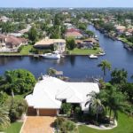 An aerial view of the navigable canal water systems in Cape Coral, FL. and property.